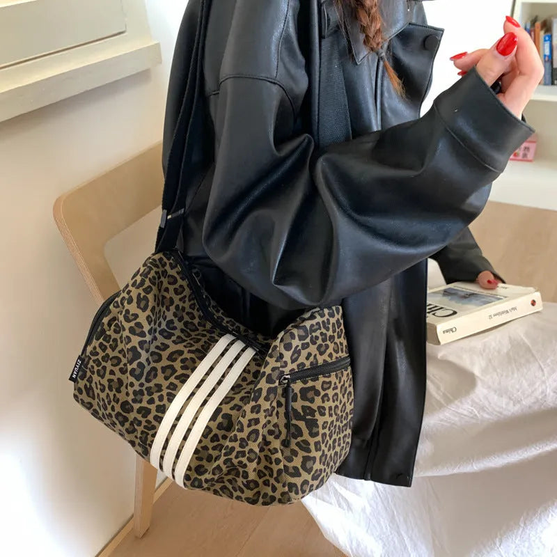 Leopard print sports style shoulder messenger bag with cross-body strap and large capacity design