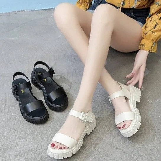 Beige women's peep toe platform sandals with ankle-strap buckle on a neutral background.