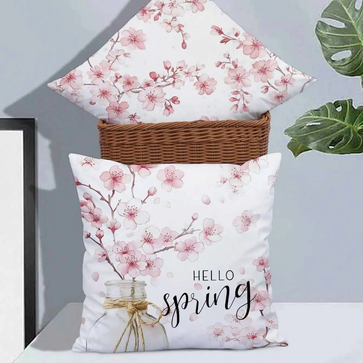 Square short velvet cushion cover with cherry blossom and letter pattern in spring colours