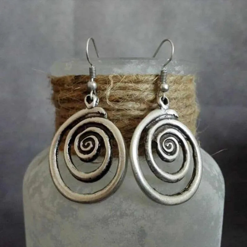 Silver geometric spiral distressed alloy earrings measuring 2.6×5cm