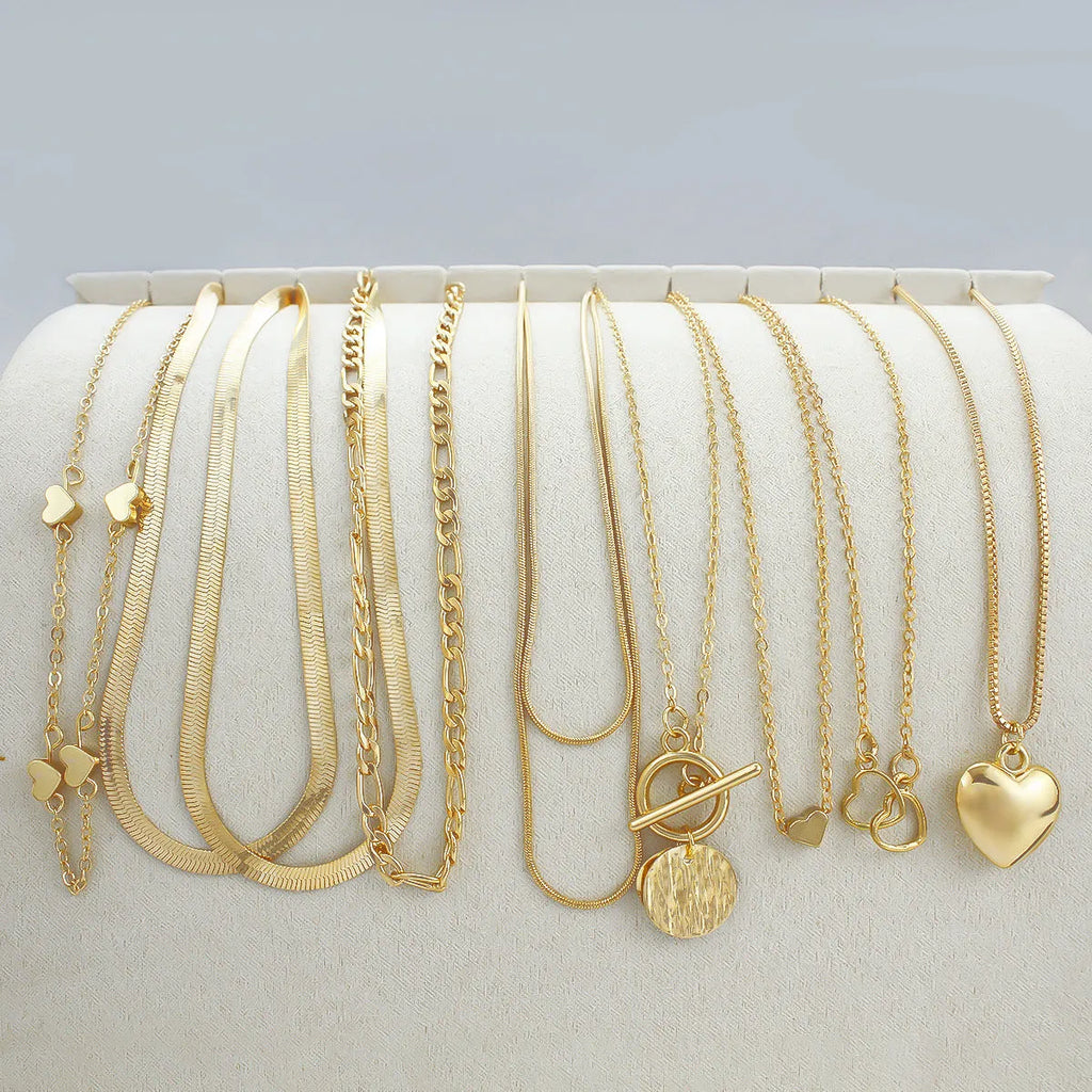 10-piece gold electroplated women's necklace set with adjustable snake chain from 21cm to 50cm length