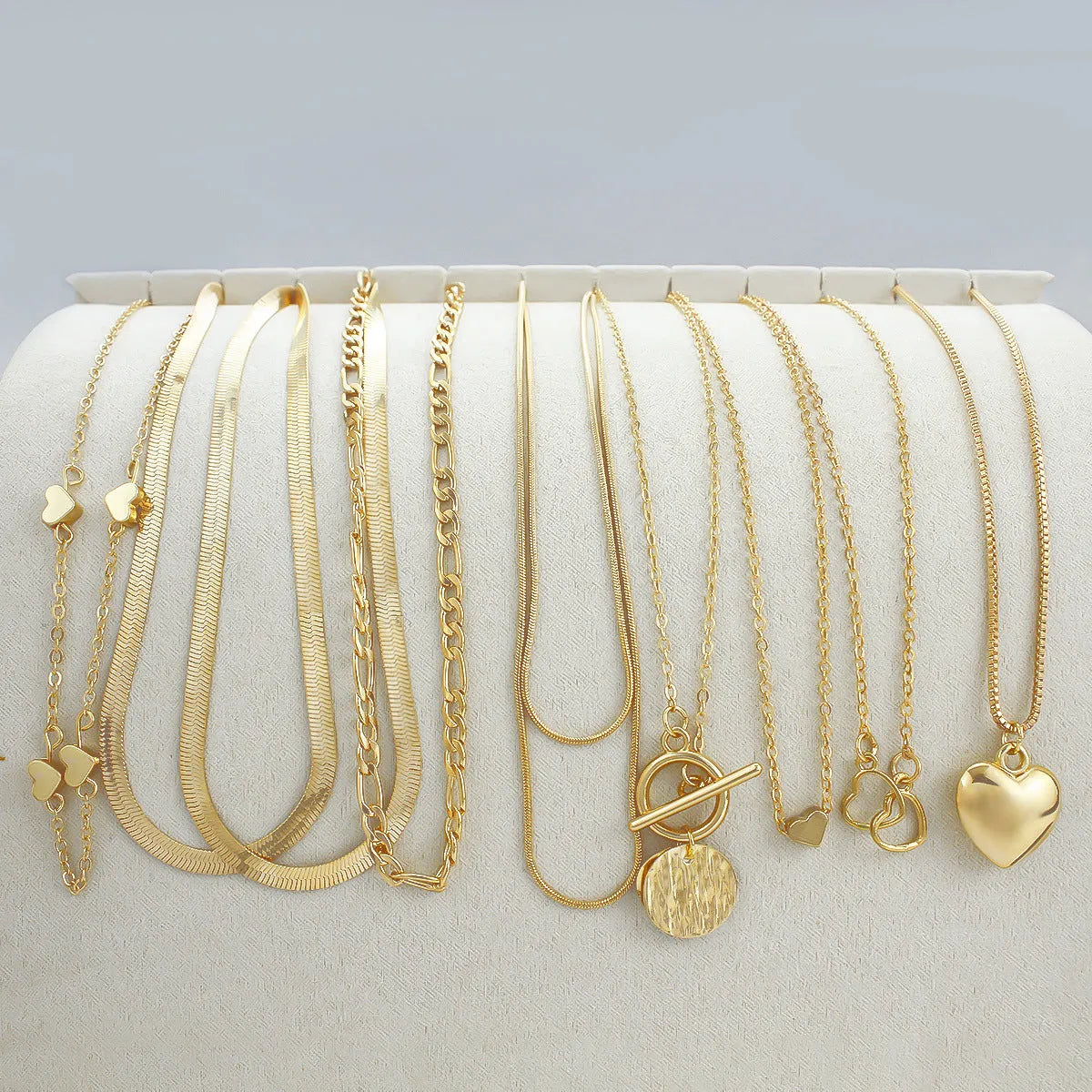 10-piece gold electroplated women's necklace set with adjustable snake chain from 21cm to 50cm length