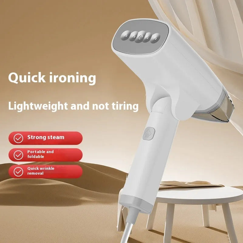 Handheld garment steamer in blue colour showing compact design with water tank
