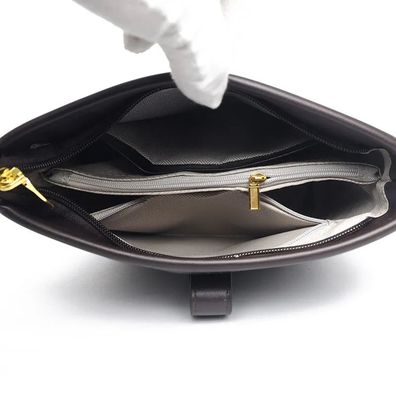 Korean style soft PU bucket messenger bag in black or brown with organised interior compartments