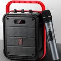 Portable MS62AI Bluetooth speaker with wireless microphone and remote control on a table