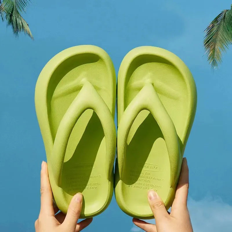 Solid colour thick-soled EVA flip-flops with a decorative bow on the strap