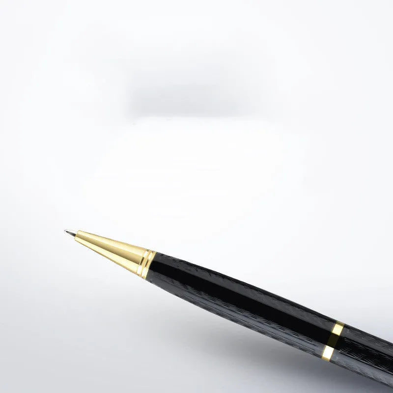 Black pen-shaped voice recorder showing dimensions with included headset and cable