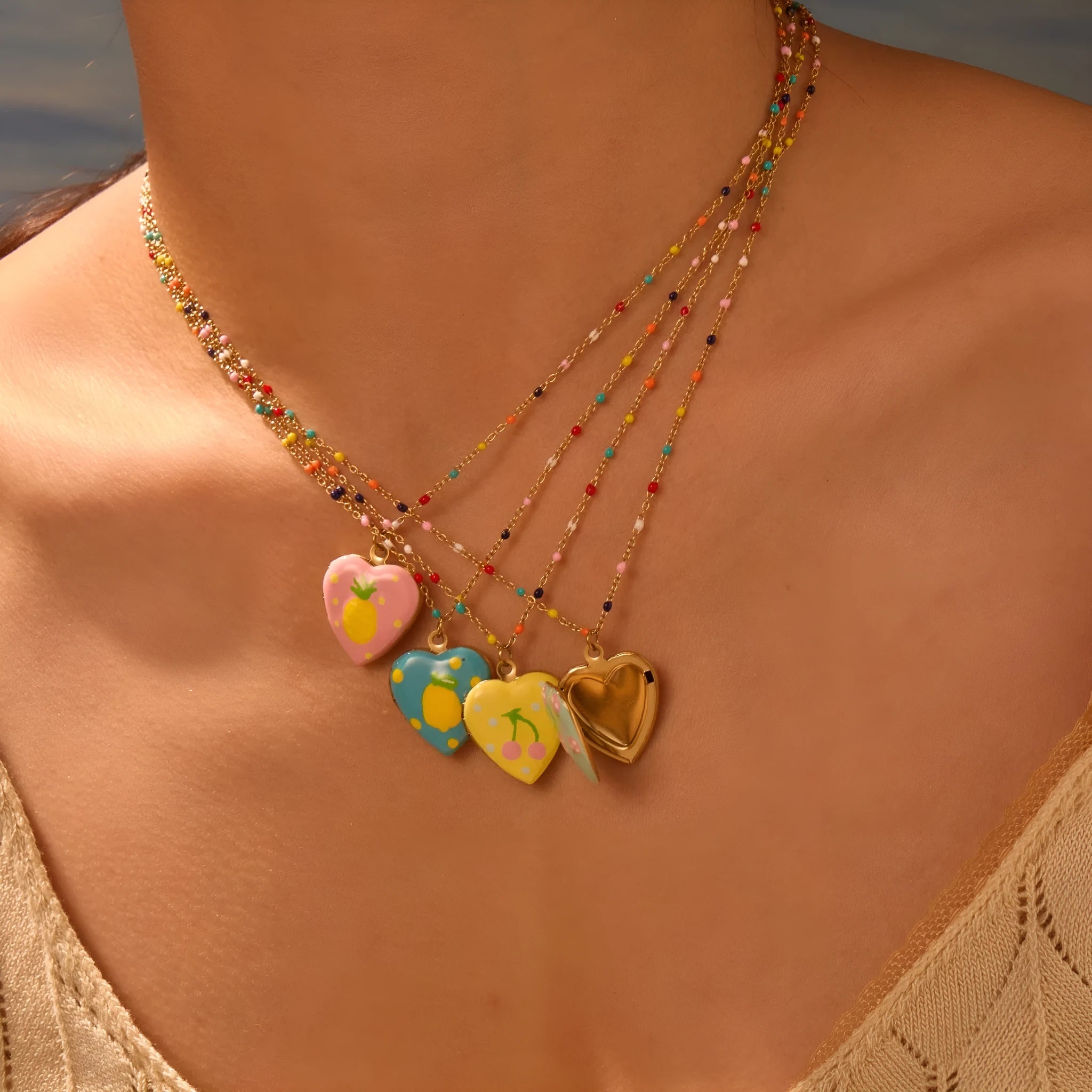 Gold-plated stainless steel necklace with fruit pendant on adjustable chain