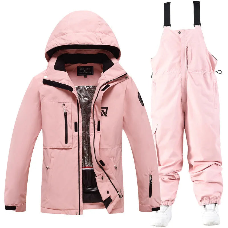 Men's and women's waterproof ski suit in blue with black trousers for winter snow sports