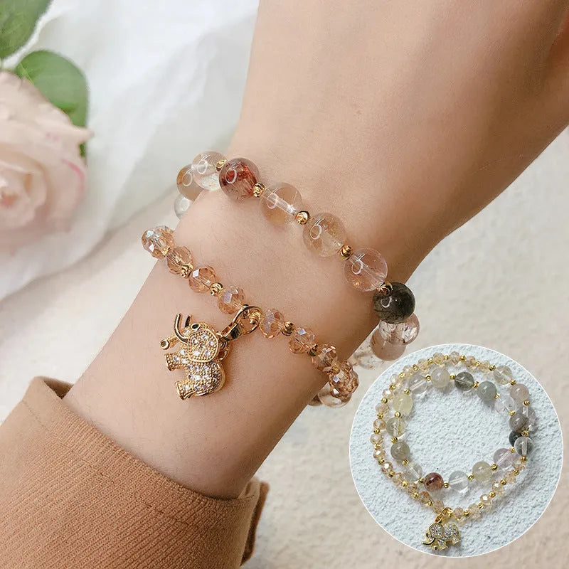 Retro multicolour bracelet for women made with colour hair crystal and strawberry quartz beads.