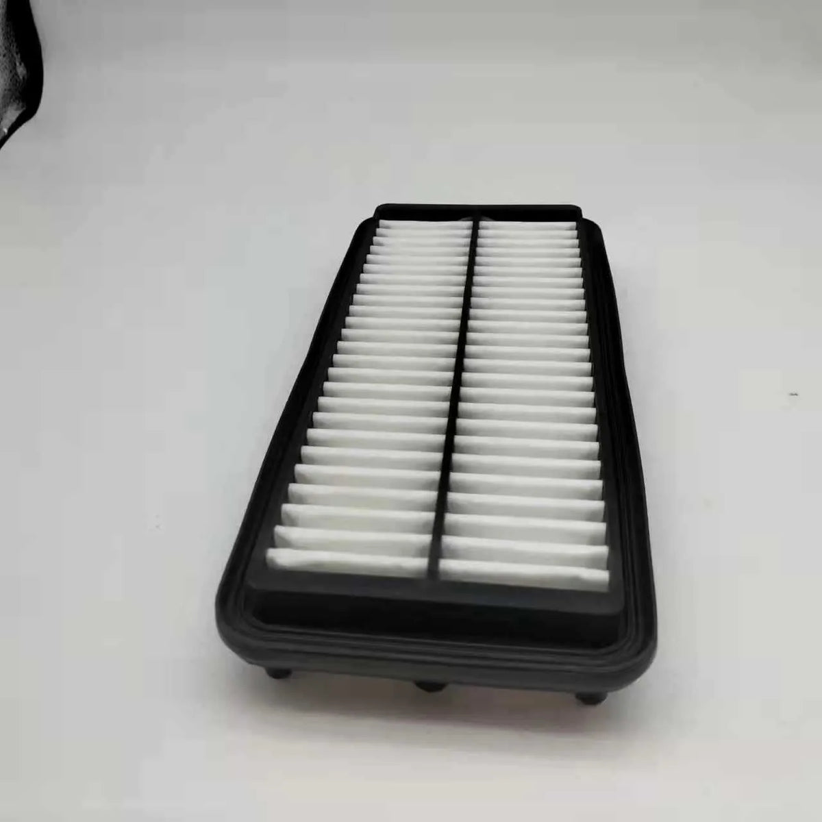 Black car air filter panel measuring 256mm x 113mm x 40mm for Modern vehicle replacement