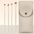 Four angled eyeliner and brow brushes with ultra thin tips in leather case