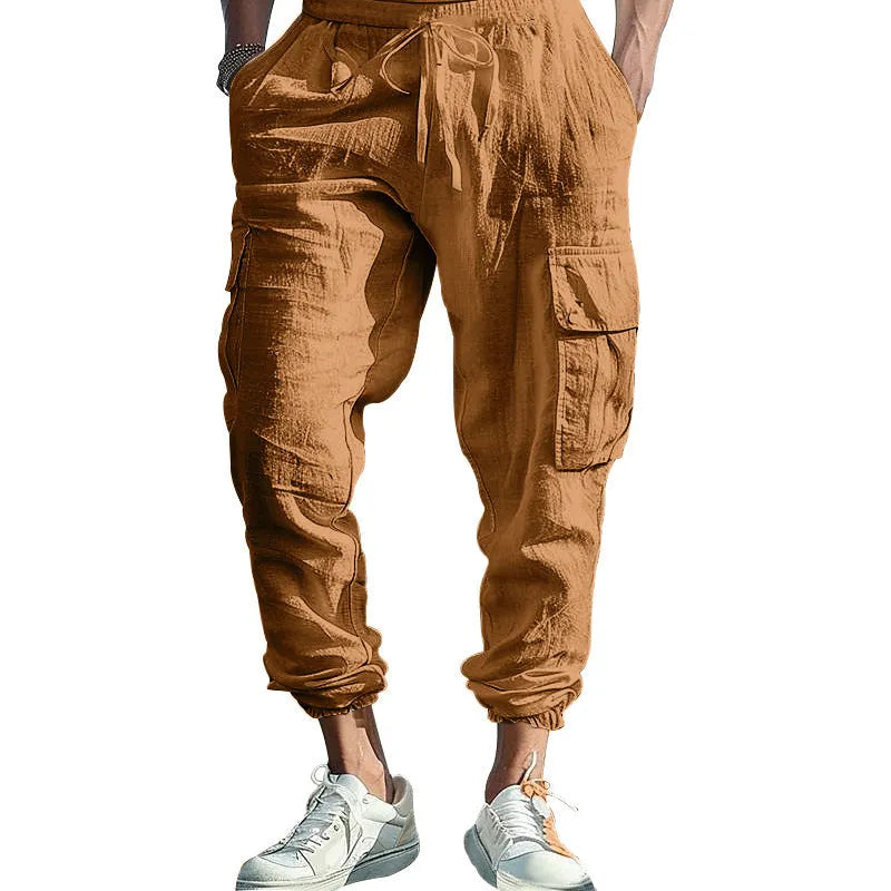 Men's loose fit linen trousers with ankle-tied hem and multiple pockets in army green.