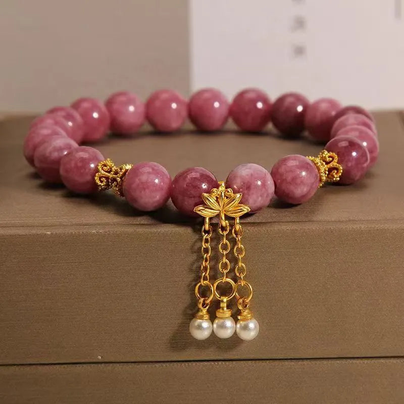 Natural stone bracelet with pink lotus tassel and pearl pendant bead in New Chinese style