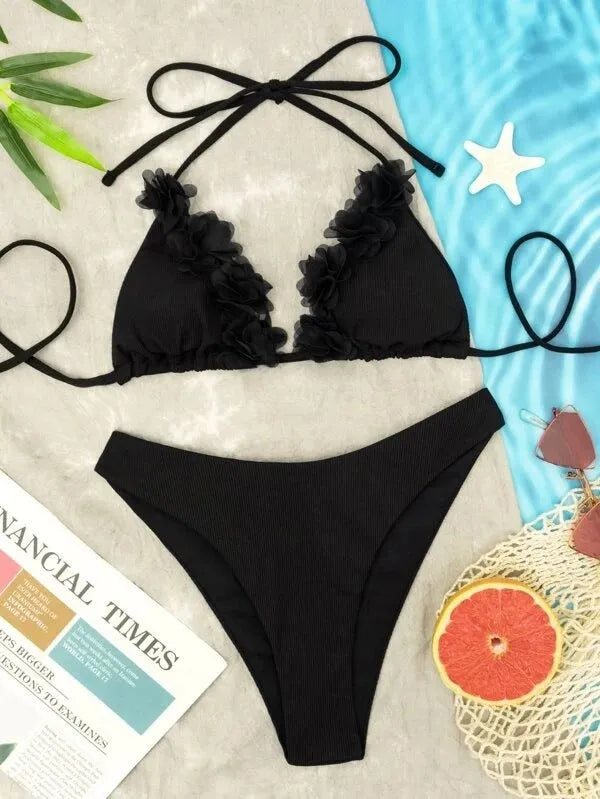 Black women's swimwear two-piece set with gathered top and matching shorts