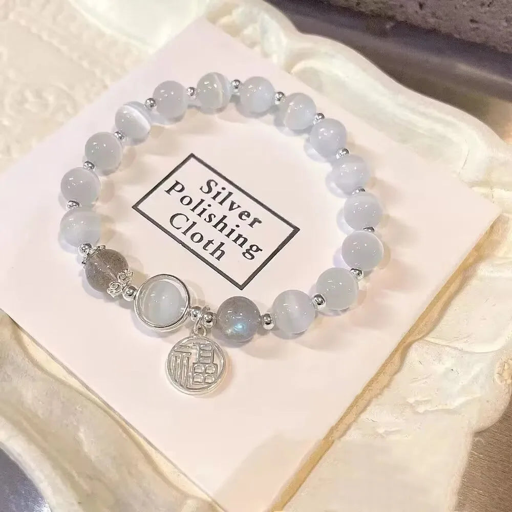 Handmade glass butterfly bracelet with coloured glaze and drop-shaped elements in grey moonlight beads
