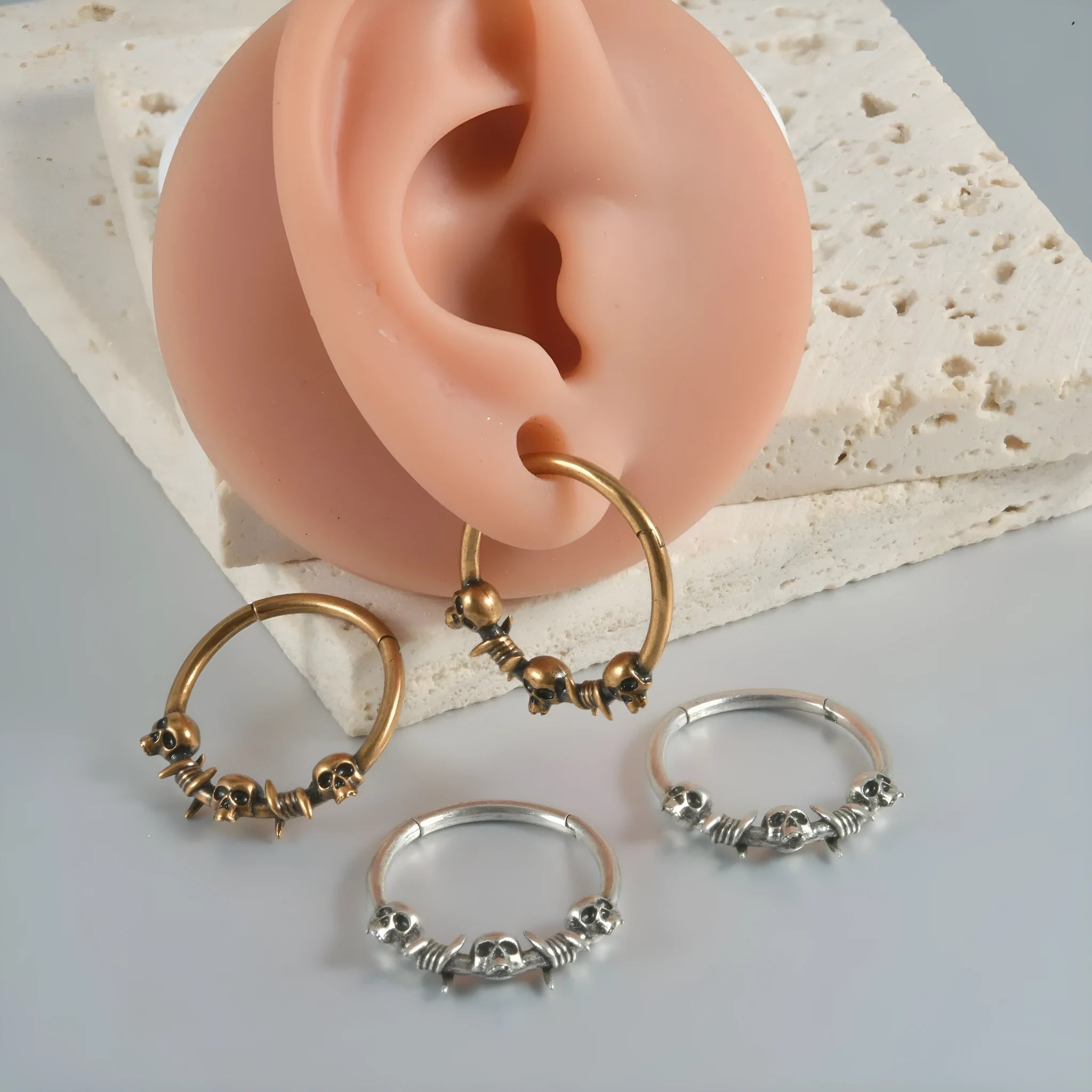 Copper ghost head punk earrings in antique silver and ancient gold finishes