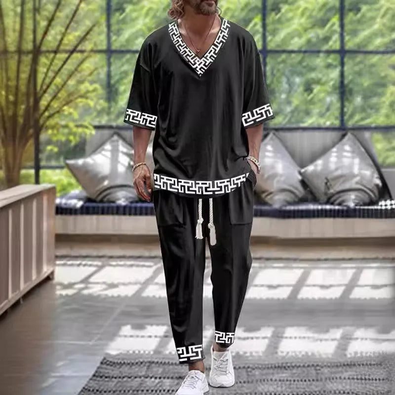 V-neck trousers suit with cropped sleeve jacket and matching trousers in thin polyester fabric