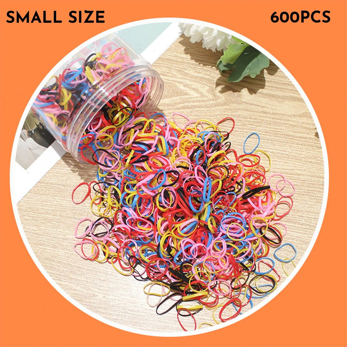 Pack of small, colourful TPU elastic hair bands for babies and toddlers in a reusable container.