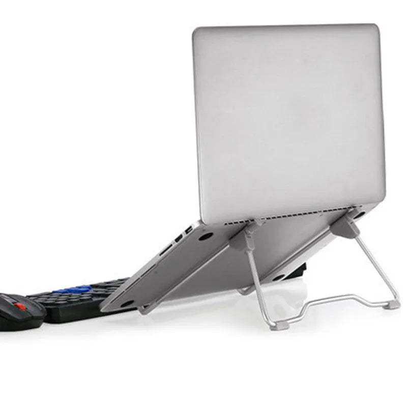 Grey aluminium alloy and plastic mobile phone stand holding a smartphone and tablet at an angle.
