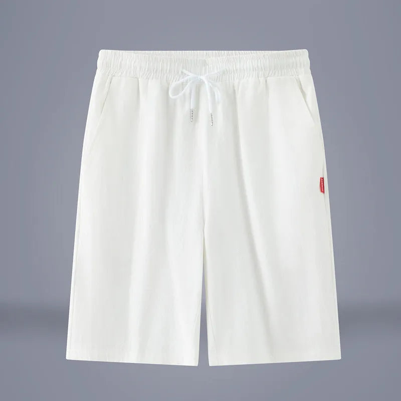 Cotton and linen cropped summer pants in a solid colour with a drawstring waist.