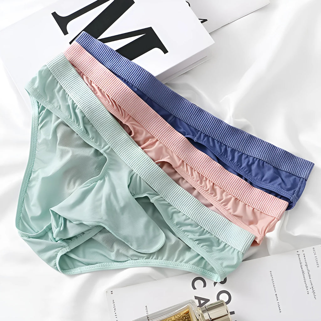 Men's low waist ice silk briefs in black, grey, purplish blue, light green or pink with a knitted construction