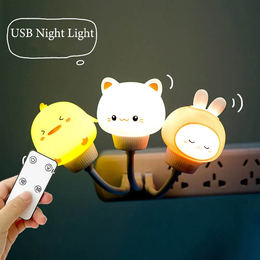 Cartoon animal USB night light in bear shape with remote control on a bedside table