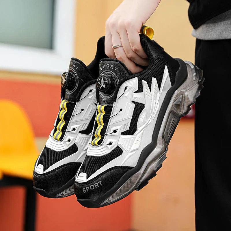 Men's black rotating button casual sneakers with mesh upper and low platform sole.