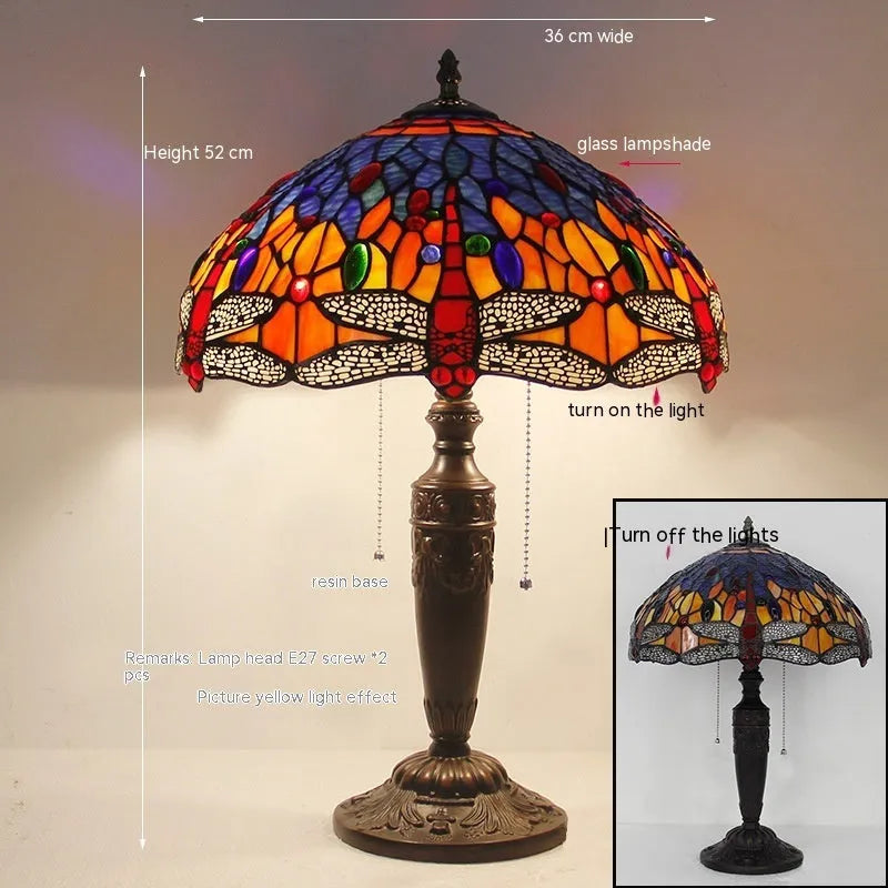 Stone table lamp with Tiffany-style blue dragonfly design on base