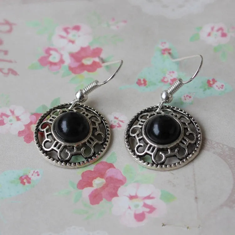 Handmade Miao silver ethnic earrings with geometric turquoise flower disk design