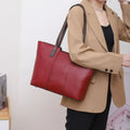 Women's genuine leather commuter shoulder bag in box-type shape with large capacity and multiple pockets
