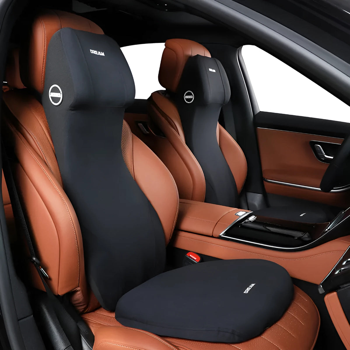 Black automotive memory foam seat cushion with integrated lumbar support headrest pillow.