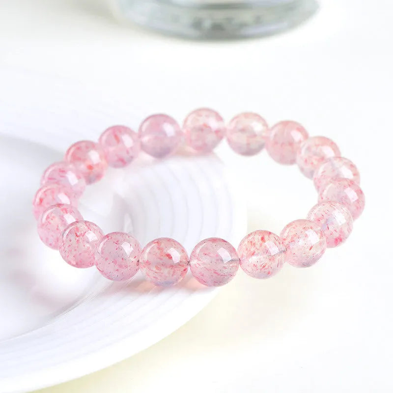 Natural white water strawberry quartz crystal bracelet with 19 round beads measuring 10-10.8mm