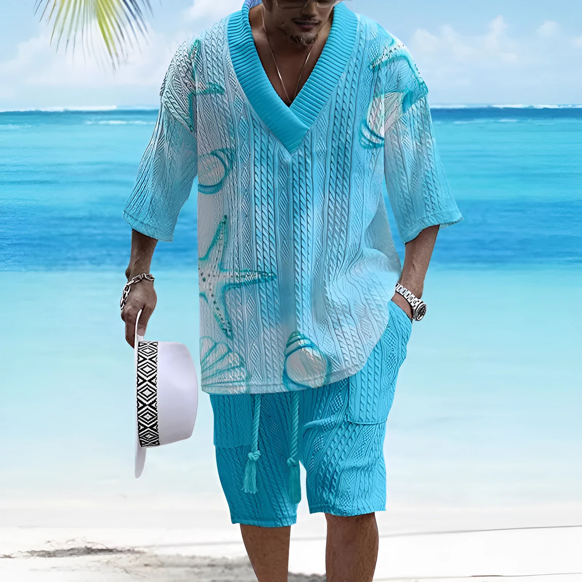 Man wearing a loose-fitting short sleeve top and matching casual shorts from a polyester suit set.