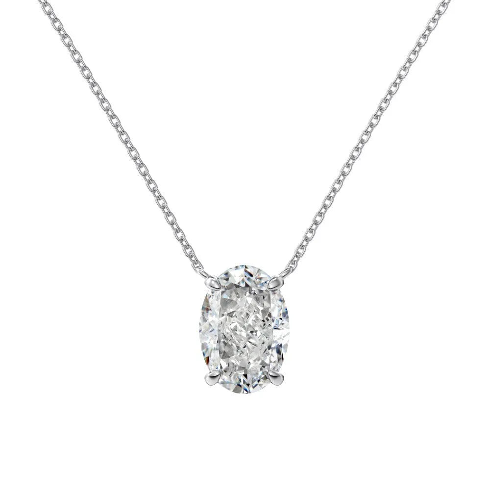 Sterling silver necklace with a geometric oval ice flower pendant in gold or platinum finish.