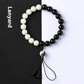 Handcrafted bodhi bead bracelet with eight-diagram pattern design featuring 11mm diameter beads