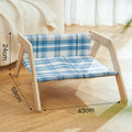 Elevated wood frame cat hammock bed with soft cloth covering in beach chair style design