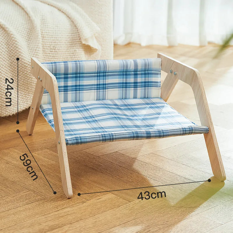 Elevated wood frame cat hammock bed with soft cloth covering in beach chair style design