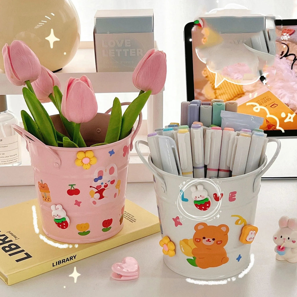 Round metal desktop pen holder in multiple colour options including green, pink, and red