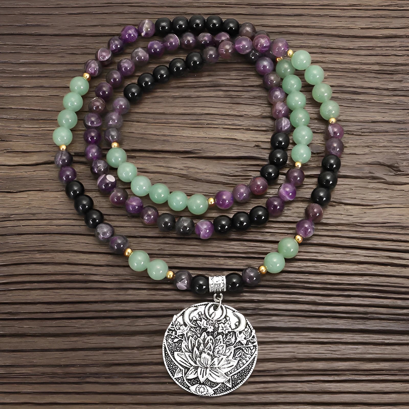 Yoga lotus pendant necklace and bracelet set with stone beads and geometric alloy pendant on adjustable chain.