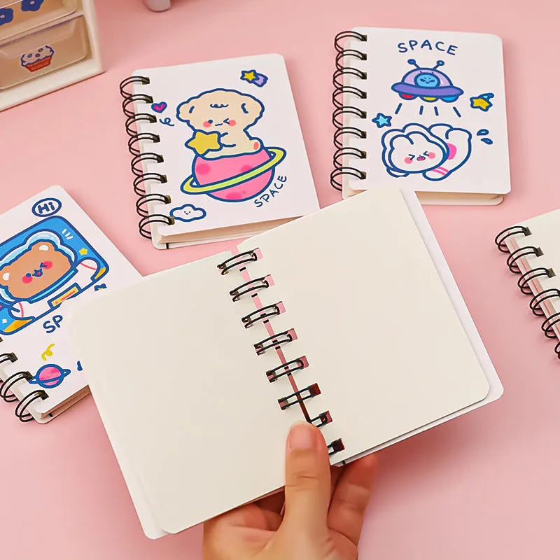 Astronaut series pocket flipper notebook showing compact 10.5x8cm size with space-themed cover design