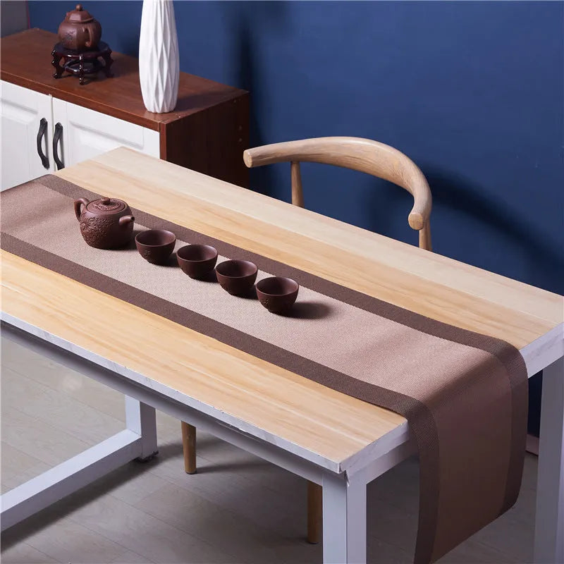 Modern PVC non-slip dish mat in gradient bamboo pattern placed in a kitchen sink.