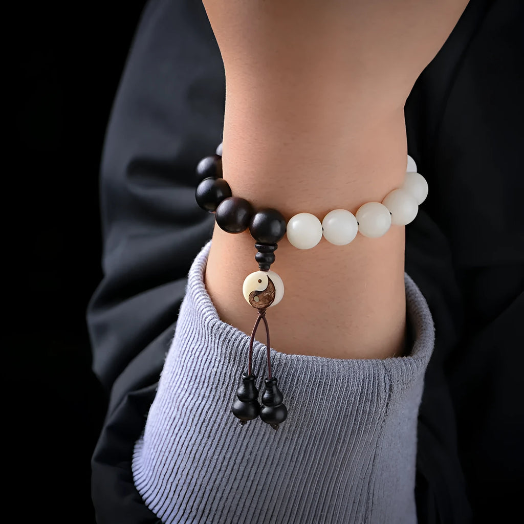 Handcrafted bodhi bead bracelet with eight-diagram pattern design featuring 11mm diameter beads