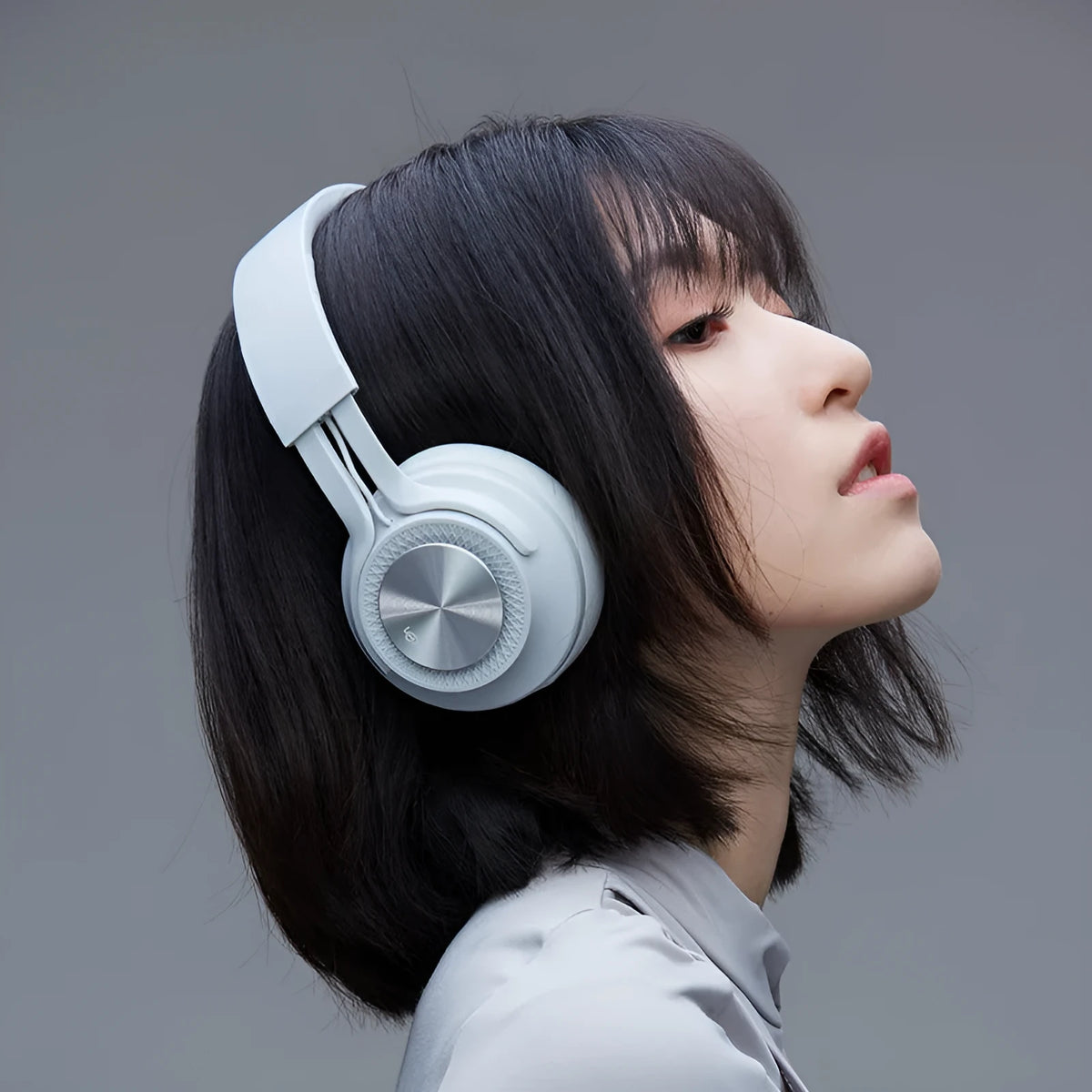 Sports wireless Bluetooth headset with 18-hour battery in black, green, grey, or red colours