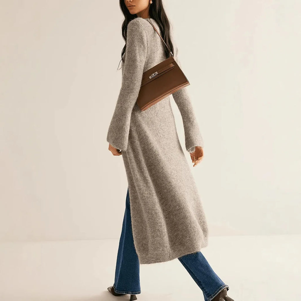 Khaki coloured French-style retro cardigan coat with button front and long sleeves.