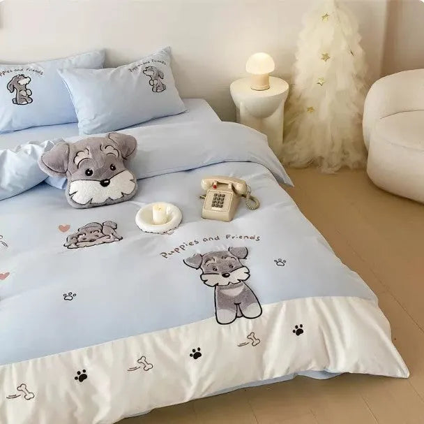 Cartoon Schnauzer design embroidered on a thickened cotton quilt cover and pillowcase from a complete bed linen set.