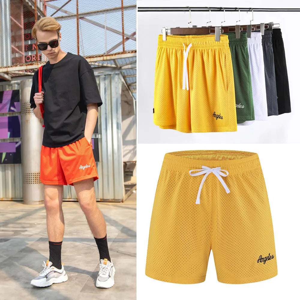 Men's double-layer mesh shorts in polyester fibre available in multiple colours for summer sport and casual wear