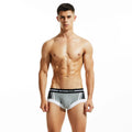 Men's cotton boxer shorts in red, dark blue, and light grey colours showing low-waist design