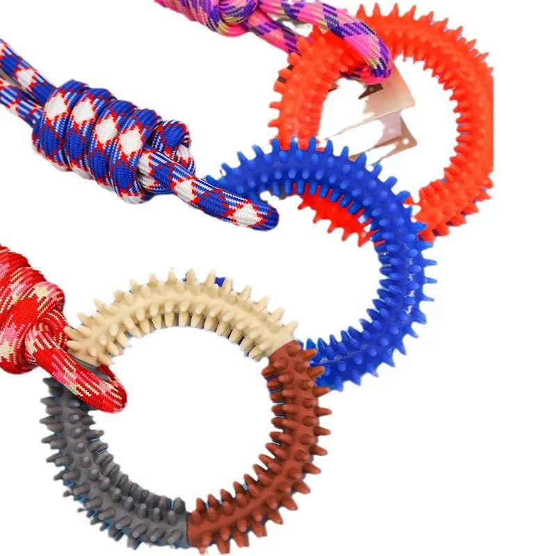 Braided cotton rope dog toy with knotted ends in assorted colours, measuring 43 cm long.