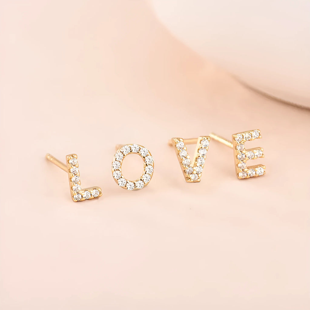 Single brass gold plated letter E earring with clear zircon stone and copper post backing